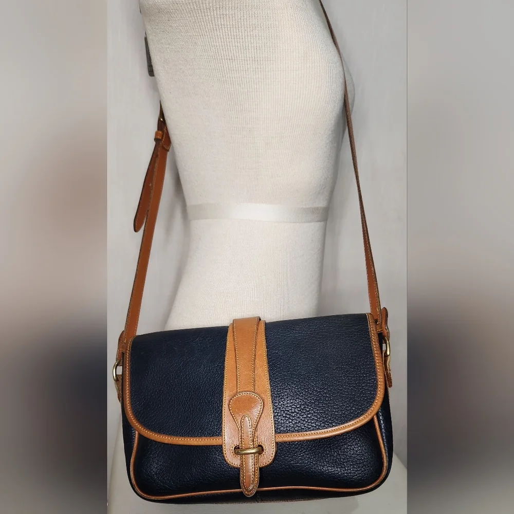 Dooney & Bourke vintage equestrian all weather leather crossbody bag, navy